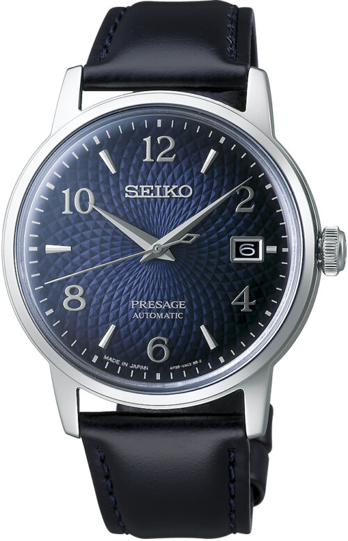 Relógio automático, caixa aço, mostrador azul, calendário, pulseira preta.